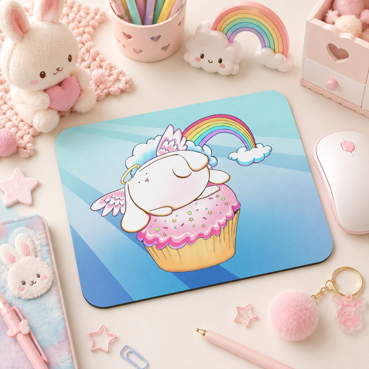 Angel Bunny Riding a Cupcake mouse pad from the Fluffy Bunnies Collection